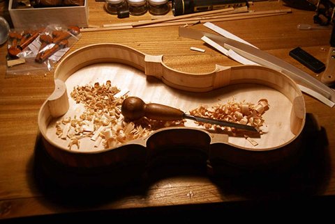 5 String Viola carving the blocks